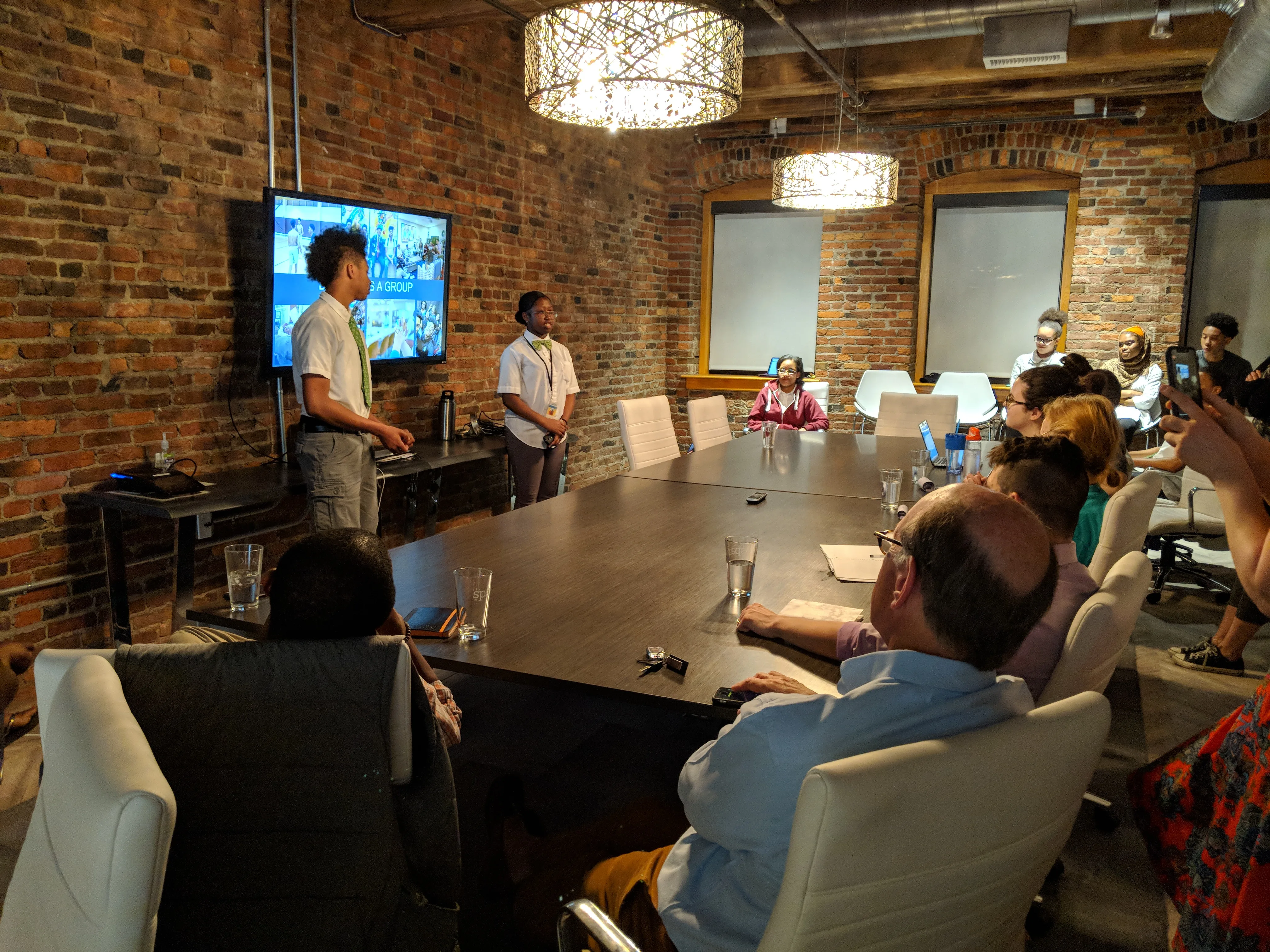 Dent Education students presenting at the Fearless office